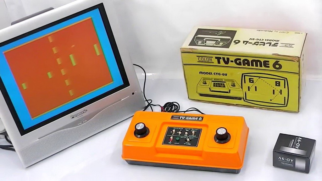 The Orange Color TV-Game 6 console connected to a TV playing a Pong-like game.